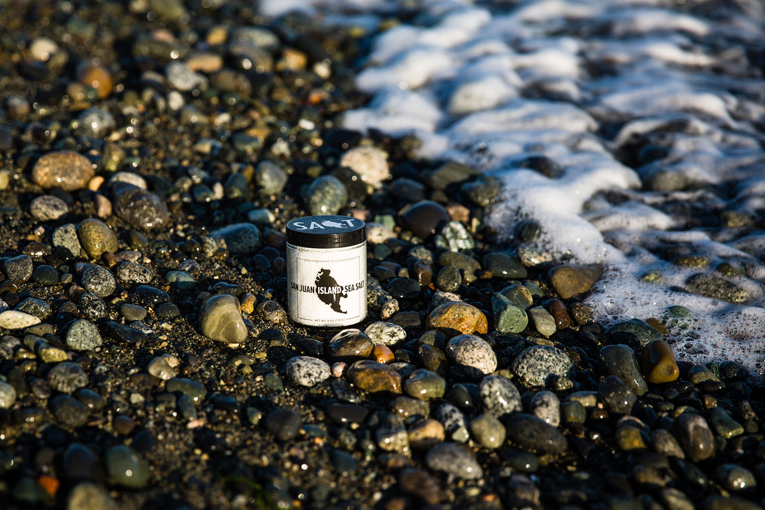 San Juan Island Sea Salt jar on the beach